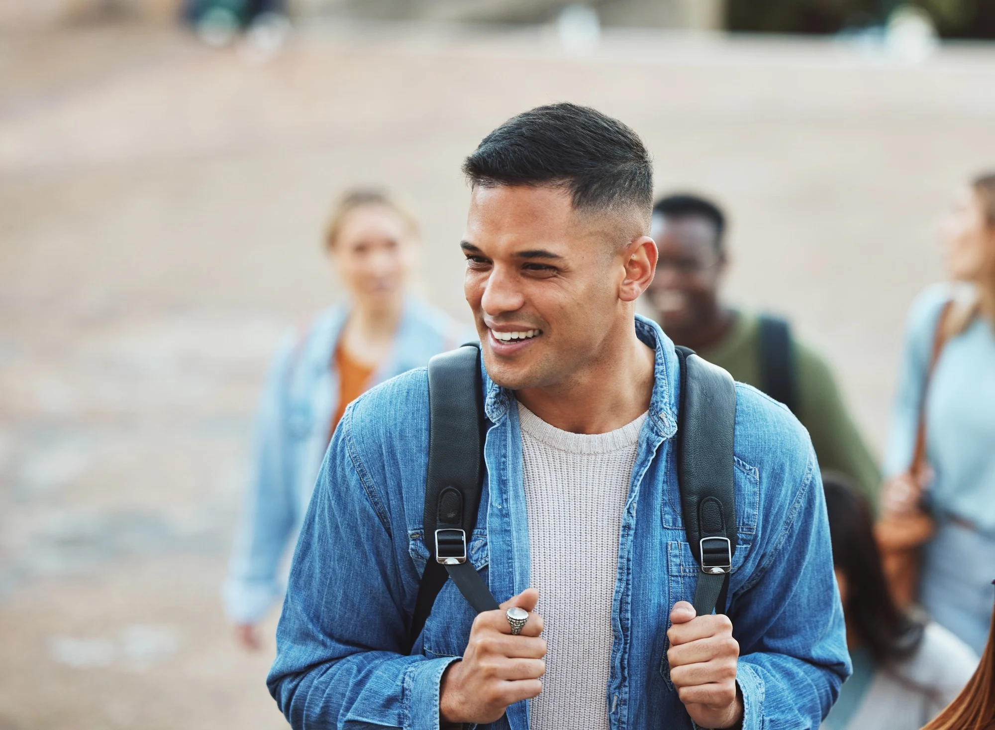 Laughing man, walking or students on university campus, college or school with scholarship, learnin Laughing man, walking or students on university campus, college or school with scholarship, learnin